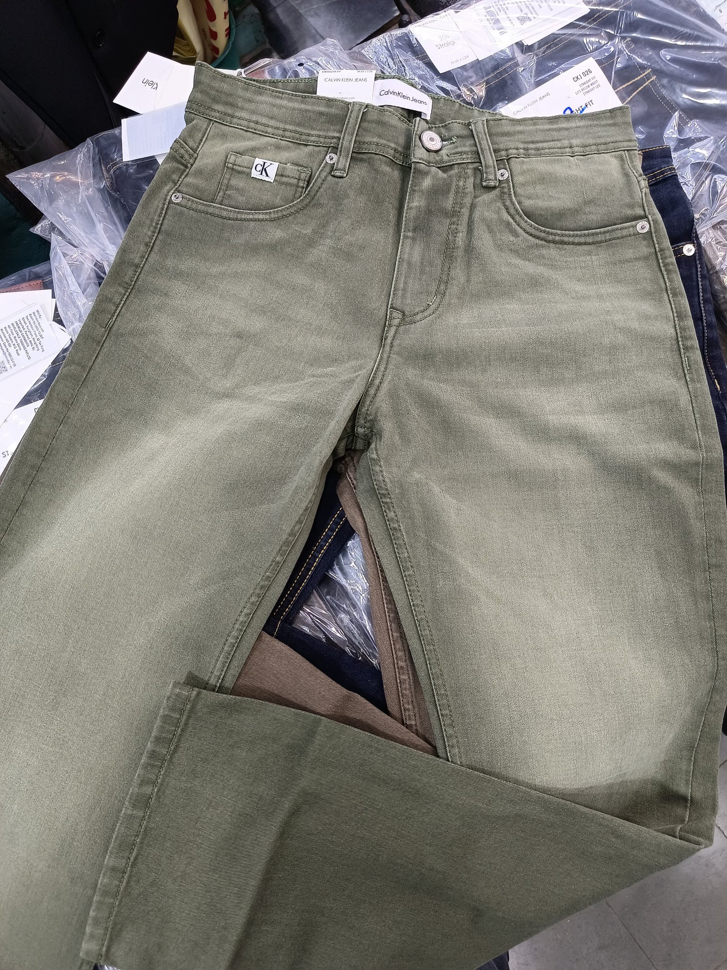 CK CALVIN KLEIN GREEN WASH JEANS