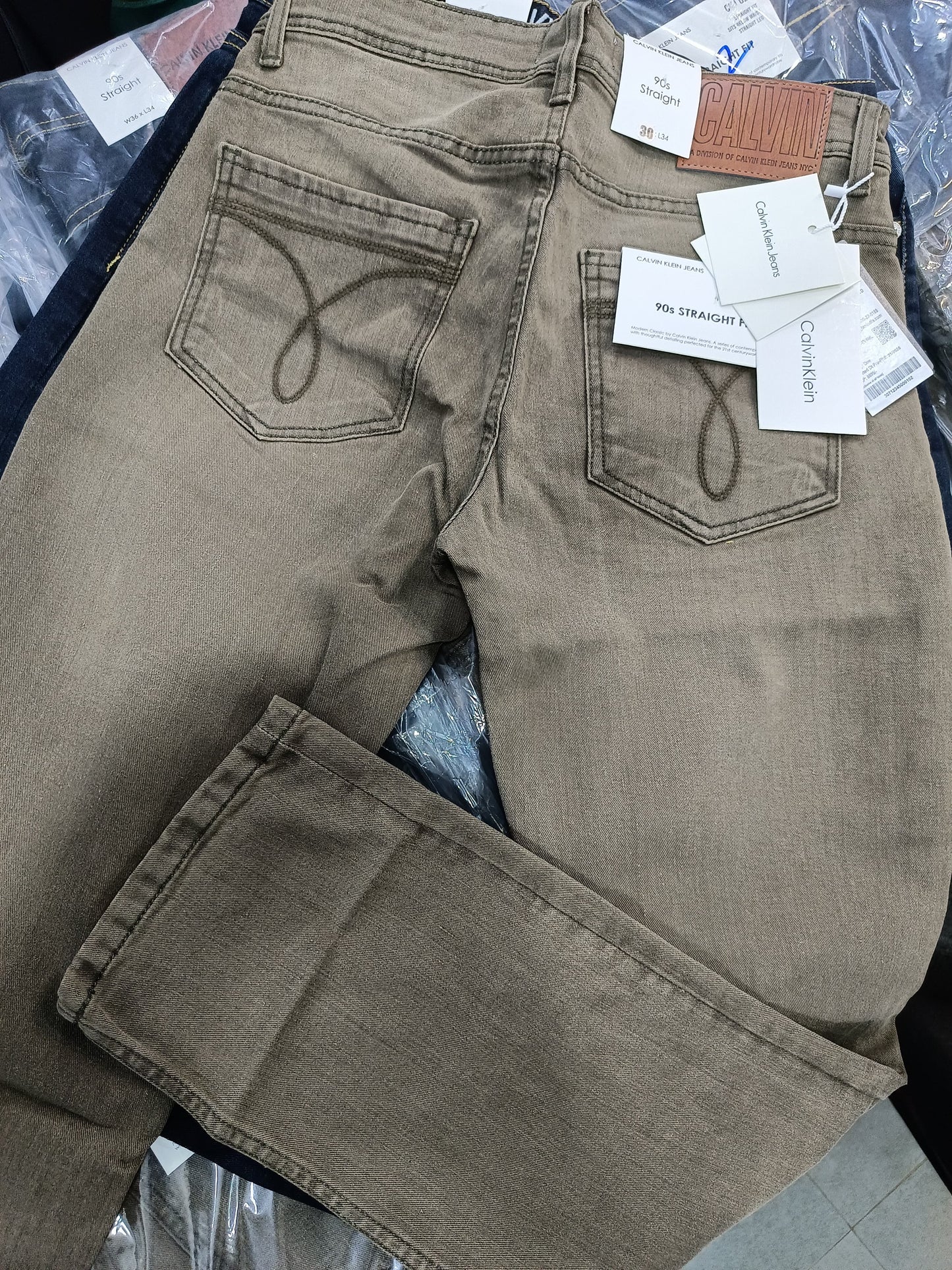 CK CALVIN KLEIN BROWN WASH JEANS